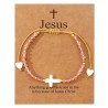 Bracelet sur corde réglable grains de forme cylindrique avec croix et coeur en coquille naturelle.
