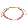 Bracelet sur corde réglable grains de forme cylindrique avec croix et coeur en coquille naturelle.