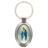 Porte-clés en métal de couleur argenté de forme ovale H. 4.3 cm. Livré en boite cadeaux. Existe avec différents Saints.