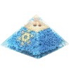 Pyramide Orgonite avec symbole metatron, L. 10 cm. Plusieurs pierres.