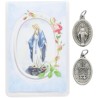 Medaille metal couleur argentee forme ovale H. 2,2 cm dans pochette avec image. Plusieurs saints