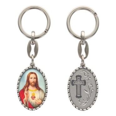 Porte-clés en aluminium de couleur argenté hauteur 3,8 cm, avec résine. Disponible avec plusieurs saints au choix.