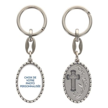 Porte-clés en aluminium de couleur argenté hauteur 3,8 cm, avec résine. Disponible avec plusieurs saints au choix.