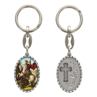 Porte-clés en aluminium de couleur argenté hauteur 3,8 cm, avec résine. Disponible avec plusieurs saints au choix.
