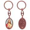 Porte-clés en aluminium de couleur cuivrée, hauteur 3,8 cm, avec résine. Disponible avec plusieurs saints au choix.
