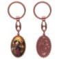 Porte-clés en aluminium de couleur cuivrée, hauteur 3,8 cm, avec résine. Disponible avec plusieurs saints au choix.