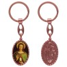 Porte-clés en aluminium de couleur cuivrée, hauteur 3,8 cm, avec résine. Disponible avec plusieurs saints au choix.