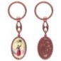 Porte-clés en aluminium de couleur cuivrée, hauteur 3,8 cm, avec résine. Disponible avec plusieurs saints au choix.
