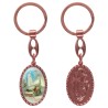 Porte-clés en aluminium de couleur cuivrée, hauteur 3,8 cm, avec résine. Disponible avec plusieurs saints au choix.