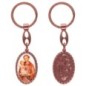 Porte-clés en aluminium de couleur cuivrée, hauteur 3,8 cm, avec résine. Disponible avec plusieurs saints au choix.