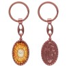 Porte-clés en aluminium de couleur cuivrée, hauteur 3,8 cm, avec résine. Disponible avec plusieurs saints au choix.