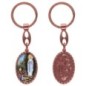 Porte-clés en aluminium de couleur cuivrée, hauteur 3,8 cm, avec résine. Disponible avec plusieurs saints au choix.