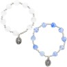 Bracelet dizainier sur élastique pour enfant avec grains forme cœur en verre Ø 7 mm et avec medaille Vierge miraculeuse.